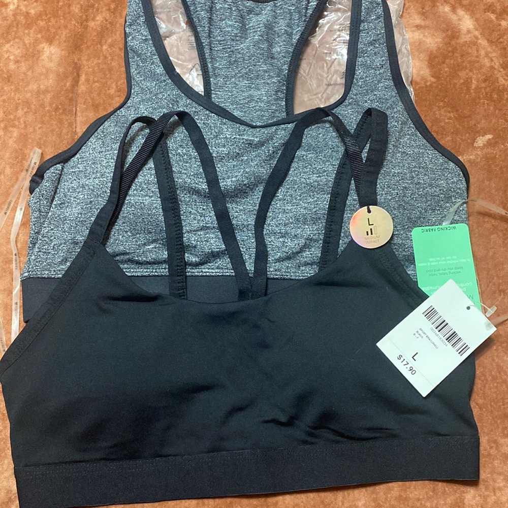 Two brand new sports bras by Forever 21 in a size large. High and medium impact